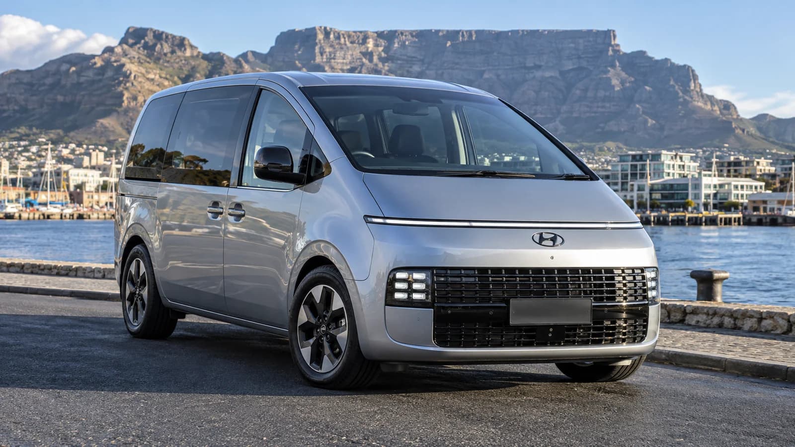 AI-generated motoring-news view of an updated silver Hyundai Staria-style people-mover in Cape Town